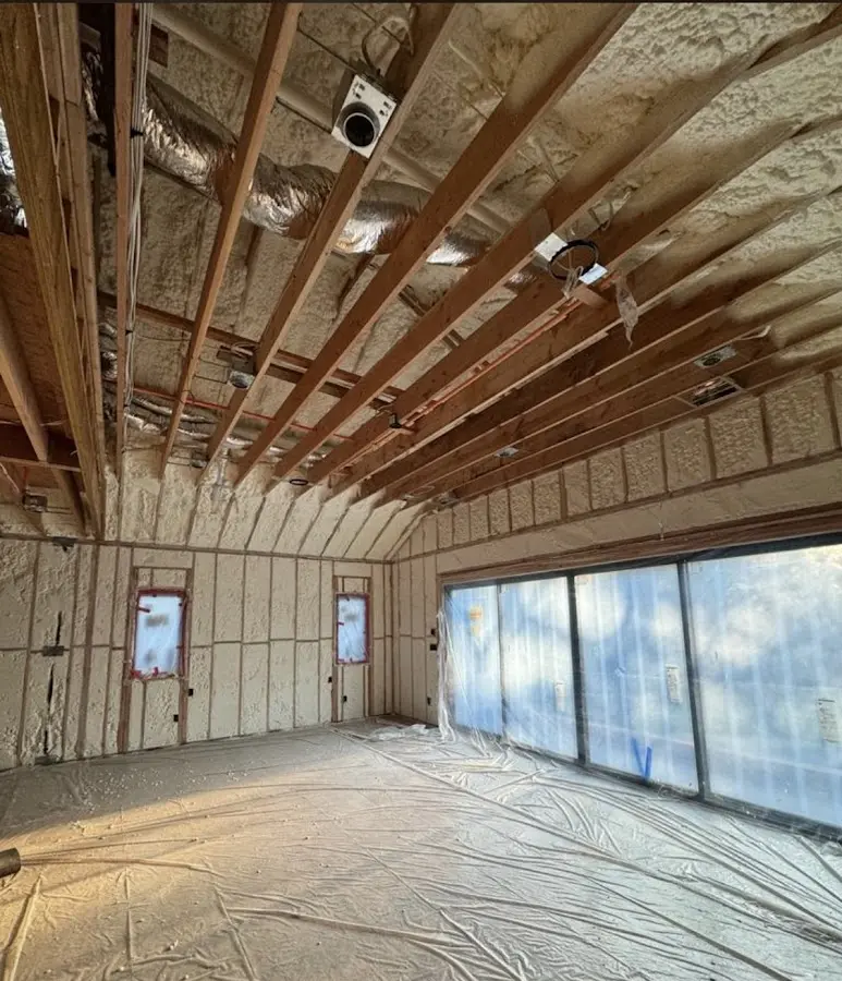 Interior walls and ceiling insulated with spray foam during new construction in Uniontown