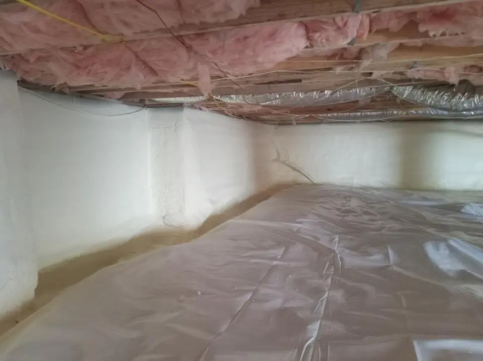 Crawl space encapsulation with closed-cell spray foam for Commercial Roof Restoration in Uniontown
